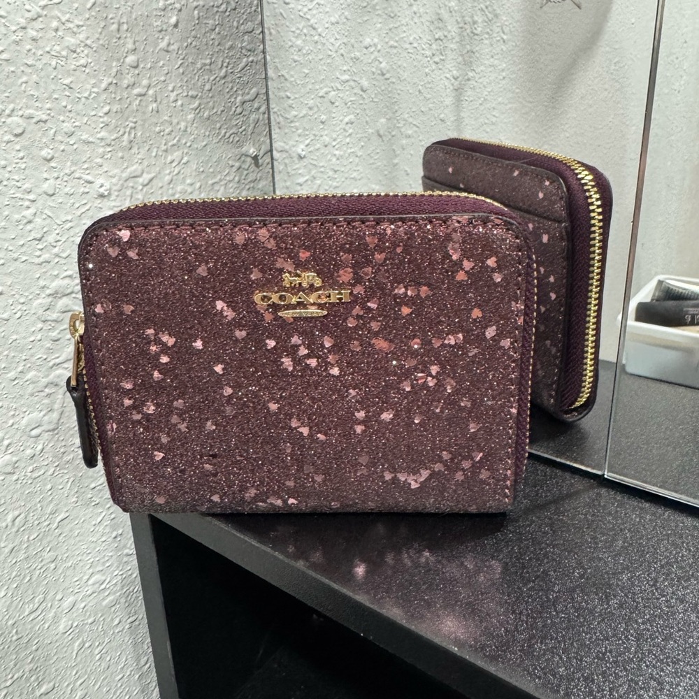 Coach small zip around wallet.